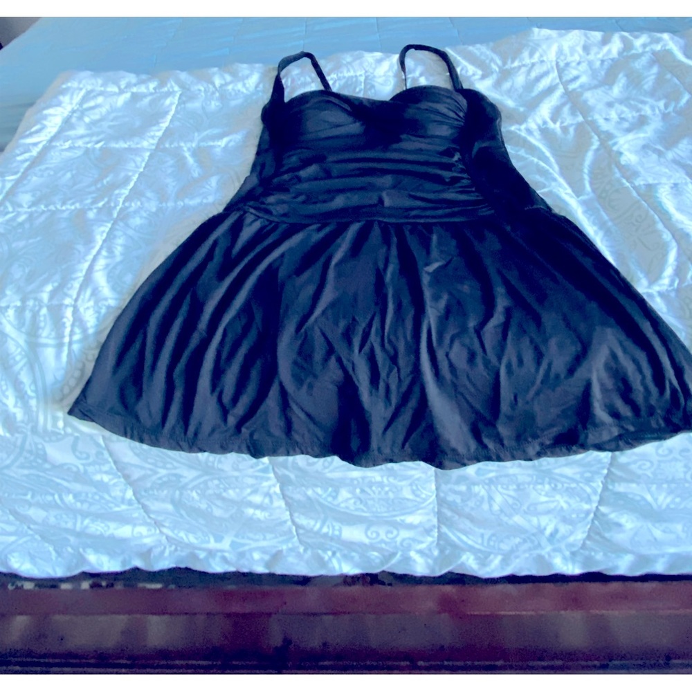 Swim suit, cover up, cinched waist, skirted, fun and flattering.